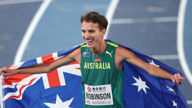 Ky Robinson celebrates after winning bronze in the 3000m event at the World Athletics Indoor Championships in Nanjing.