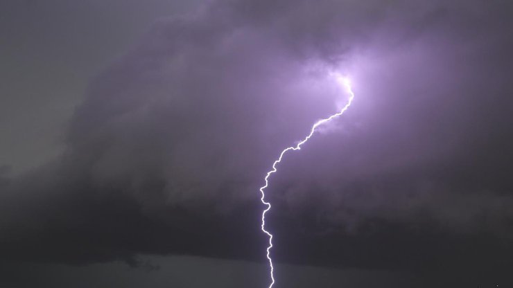 Wild weather smashes southeast Queensland on Anzac morning, injuring three people.