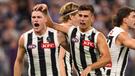 Collingwood celebrate their win over Fremantle. 