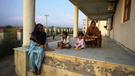 Women and children living near the border have relocated to safer areas after artillery shelling. (AP PHOTO)